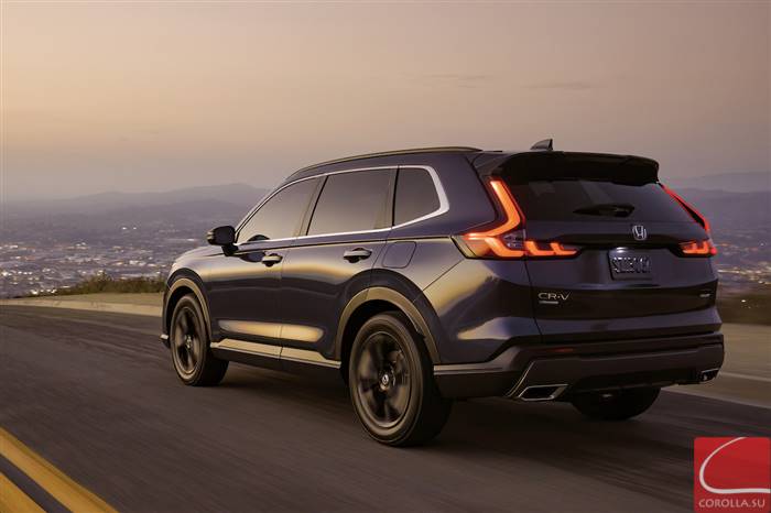 2023 Honda CR-V – a RAV4 competitor – posted driving off into the sunset.