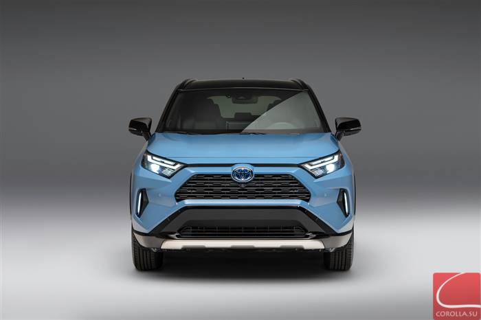 A blue 2023 Toyota RAV4 XSE against a silver/gray background.